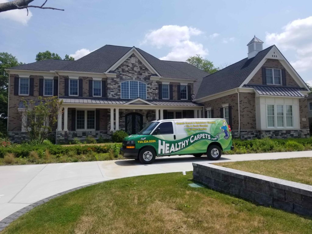 Healthy Carpets van in front of clients home in Ann Arbor michigan