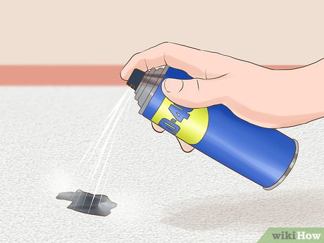 Removing tar from carpets and upholstery